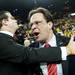 Indiana head coach Tom Crean is held back after getting in a confrontation with a member of the Michigan coaching staff on Sunday, March 10. Daniel Brenner I AnnArbor.com